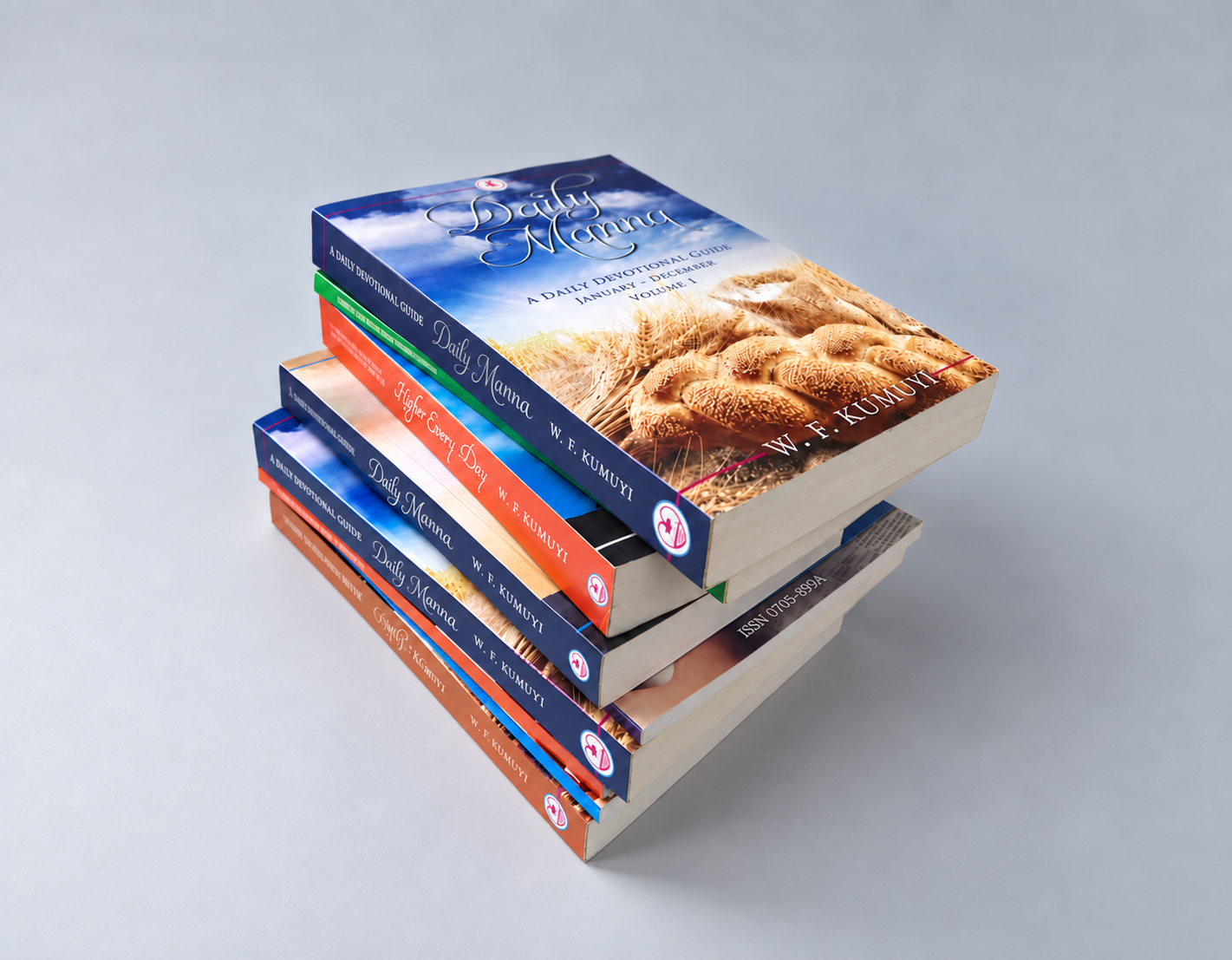 Stack of paperback books with colorful covers