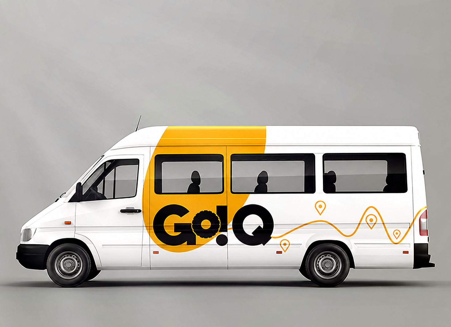 Logo and vehicle branding applied to a passenger van